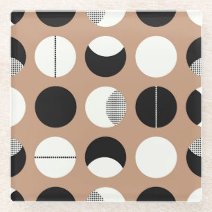 Black, white circles, brown background. glass coaster