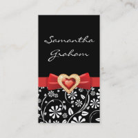 Black white floral pattern with red bow and jewel