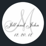 Black White Grey Monogram 2012 Wedding Sticker<br><div class="desc">Black, White and Grey Monogram Names 2012 Wedding Seal. Elegant wedding stickers with monogram, wedding date and bride and groom names which you can customise with your personal information and wedding colour scheme. A great sticker for wedding favour stickers, cake box labels, wedding treat bag seals, and wedding invitation envelope...</div>