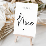 Black & White Hand Scripted Table NINE Table Number<br><div class="desc">Simple and chic table number cards in classic black and white make an elegant statement at your wedding or event. Design features "table [number]" in an eyecatching mix of classic serif and handwritten script lettering. Design repeats on both sides. Individually numbered cards sold separately; order each table number individually from...</div>