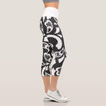 Black & White Lace Capri Leggings<br><div class="desc">The white lacy design with a black background is making a statement of simple yet elegant. Grab this for yourself or as a gift for the female in your life.</div>