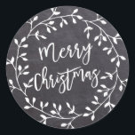 Black White Merry Christmas Chalkboard Wreath Classic Round Sticker<br><div class="desc">Chic and contemporary white wreath on black chalkboard creates a fresh and modern Christmas envelope seal. Merry Christmas is written in a hip and trendy font that complements the wreath perfectly.</div>