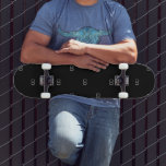 Black white monogram initials minimalist skateboard<br><div class="desc">A stylish black background decorated with your monogram initals as a pattern. White letters. For both him and her.</div>