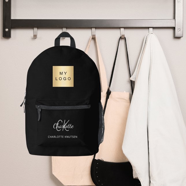 Black white monogram initials name business logo printed backpack (Creator Uploaded)