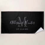 Black White Monogram Newlywed Wedding Personalised Beach Towel<br><div class="desc">Off to the honeymoon with this Black White Monogram Newlywed Wedding Personalised Beach Towel. This is a modern customisable design in black, white and grey. Bride and groom's first names are on the centre in modern white handwriting script lettering and initial of new last name is in grey. Established date...</div>