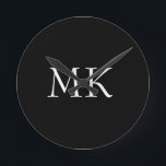 Black White Monogram  Round Clock<br><div class="desc">Modern Black White Monogram Suitcases. Beautiful design featuring white double initial monogram text on black. Personalise with your own text. Would make an excellent gift for birthdays,  holidays,  graduations,  promotions,  any special occasion,  or everyday.</div>