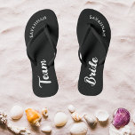 Black White Name Bride Bridal Party Bachelorette Jandals<br><div class="desc">A simple black and white minimalist typography design for a bridal shower, bachelorette party or beach wedding. The text is customisable and can be personalised with your own name and bride slogan. For example, Bride Squad instead of Team Bride, Bride repeated on the left and right foot, or something else....</div>