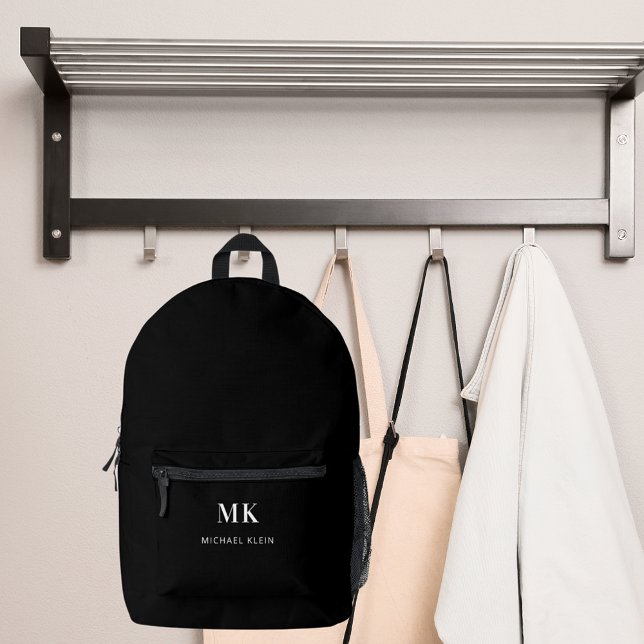 Black white name monogram initials printed backpack (Creator Uploaded)