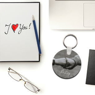 Black-white photo of hands of two people keychain