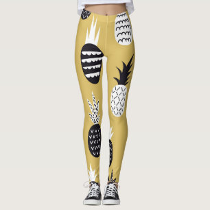 Black, white pineapples, yellow background leggings