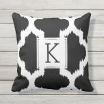 Black & White Quatrefoil Ikat Style Outdoor Cushion<br><div class="desc">Modern black and white quatrefoil ikat style with customisable monogram and changeable black background colour.</div>