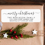 Black White Script Christmas Return Address Label<br><div class="desc">Modern Elegant Black and White Script Family  Name Christmas Return Address Labels. Featuring a pretty hand-written calligraphy swash-tail font script with saying "Merry Christmas". Great for Christmas holiday season,  easy to personalise them with your names and return address info.</div>