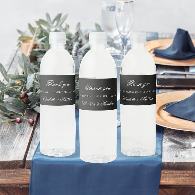 Black white script wedding thank you water bottle label (Creator Uploaded)