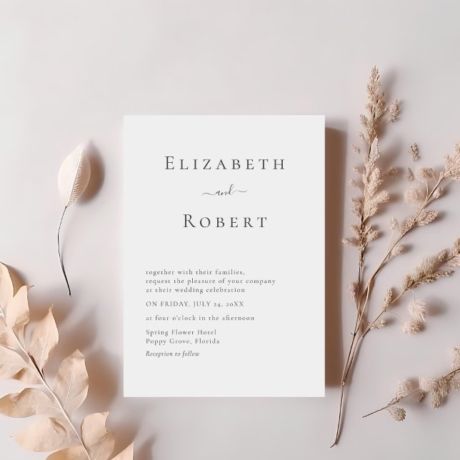 Black & White Simple Minimalist Wedding Invitation (Black & White Simple Minimalist Wedding Invitation on a table with pale pink dry flowers.)
