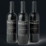 Black & White String Lights Snow Merry Christmas  Wine Label<br><div class="desc">Celebrate the season with this stylish custom Christmas wine label. This label design features "Merry Christmas" text and a festive snowflake and string lights background. You can personalise the text. More holiday stationery and party supplies are available at my shop BaraBomDesign.</div>