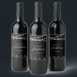 Black & White String Lights Snow Merry Christmas  Wine Label<br><div class="desc">Celebrate the season with this stylish custom Christmas wine label. This label design features "Merry Christmas" text and a festive snowflake and string lights background. You can personalise the text. More holiday stationery and party supplies are available at my shop BaraBomDesign.</div>