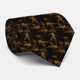 black with orange leaves off tie