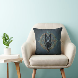Black wolfs head with piercing blue eyes cushion