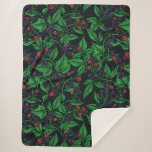 Blackberries on dark grey sherpa blanket