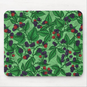Blackberries on green mouse pad