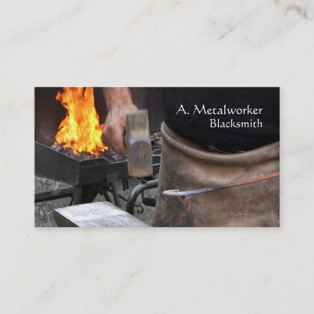 Blacksmith at work with forge business card (Front)