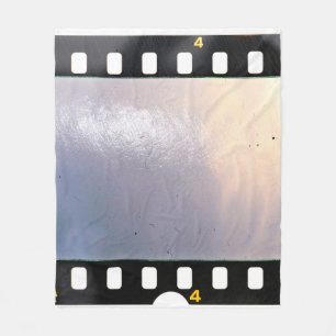 Blank 35mm film frame or strip on white background fleece blanket