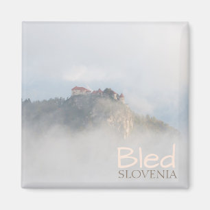 Bled castle surrounded by clouds magnet