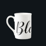Blessed Black White Modern Script Christian Bone China Mug<br><div class="desc">This mug has the word "Blessed." in a modern script in black on white. You may personalise or leave as is. Great gift for your Christian family and friends. Designed by artist © Susan Coffey.</div>