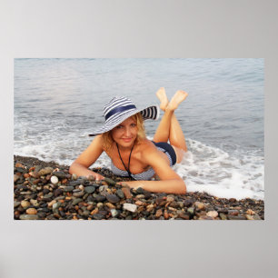 Blonde woman at the beach poster