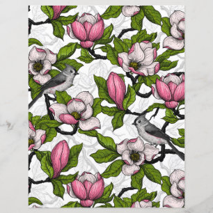 Blooming magnolia and titmouse bird