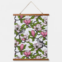 Blooming magnolia and titmouse bird