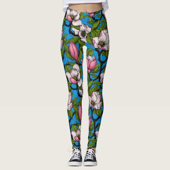 Blooming magnolia on blue leggings (Front)