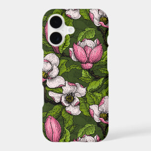 Blooming magnolia on dark green