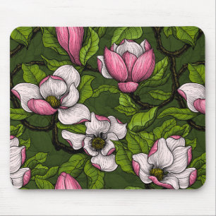 Blooming magnolia on dark green mouse pad