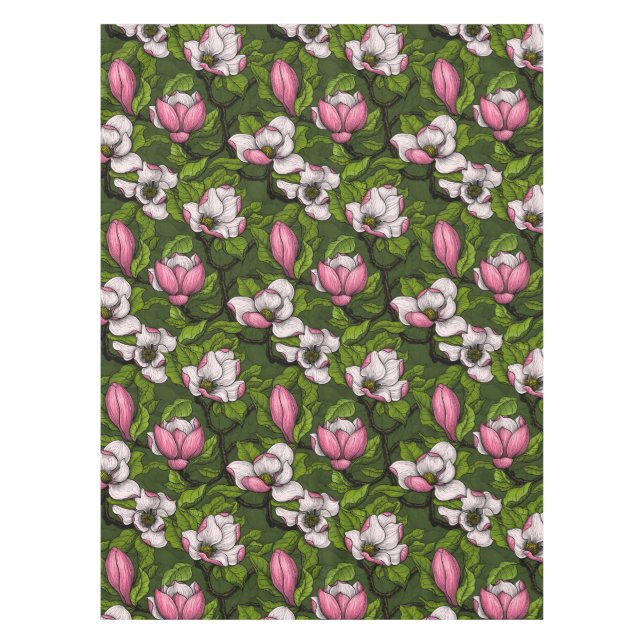 Blooming magnolia on dark green tablecloth (Front)