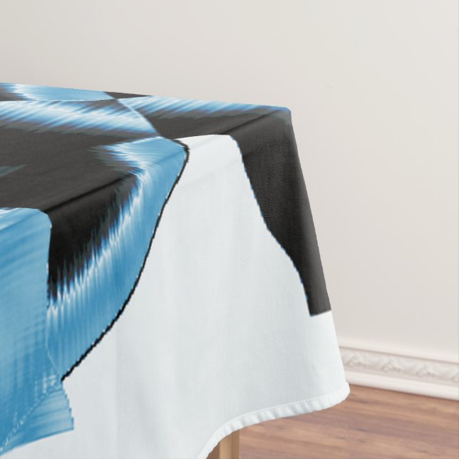 Blue and black scraps or ribbons being destroyed tablecloth (In Situ)