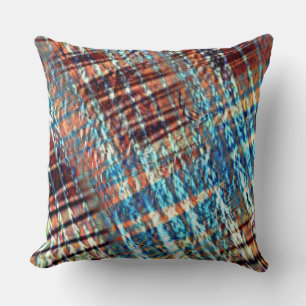 Blue and brown strokes rustically crossed in silky cushion