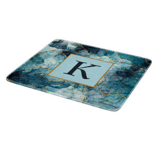 Blue and gold glittery marble monogram cutting board