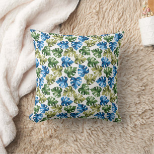 Blue and green monstera leaf pattern cushion