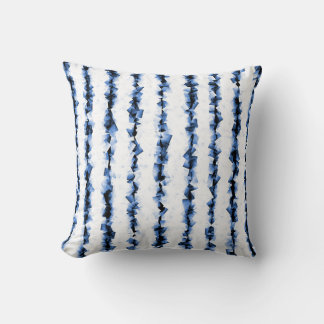 blue and grey crinkly textured lines on white cushion