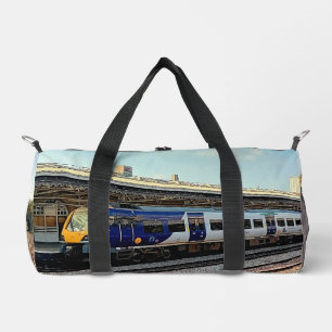 Blue and silver train duffle bag