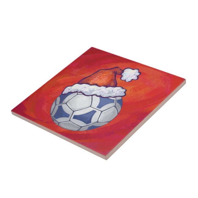 Blue and White Festive Soccer Ball on Red Tile (Side)