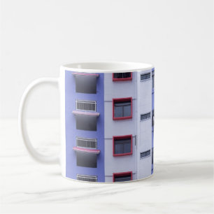 Blue and white high-rise building coffee mug
