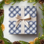 Blue and White Plaid Wrapping Paper<br><div class="desc">Transform your holiday season with our exquisite Blue and White Plaid Wrapping Paper featuring a stunning watercolor navy blue and white buffalo plaid pattern. This wrapping paper radiates timeless elegance and festive charm, making every gift as beautiful on the outside as it is meaningful on the inside. Dive into a...</div>