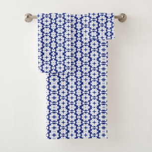 Blue and white towels feature an intricate