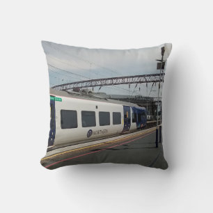 Blue and white train cushion