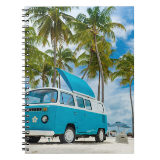 Blue and white van on beach notebook