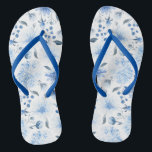 Blue and White Watercolor Floral Flip Flop Sandals<br><div class="desc">These blue and white floral flip flops feature beautiful water colour flowers in an all over pattern with matching blue straps.  These sandals would be great with your favourite denim blues. Comfortable enough for a walk on the beach or for everyday wear.</div>