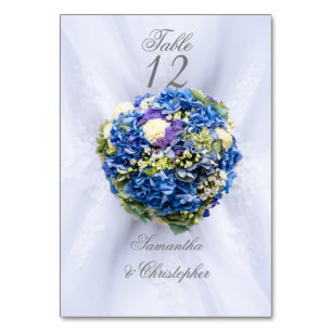 Blue and white wedding flower table number