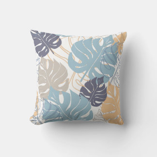 Blue and yellow monstera leaf pattern cushion